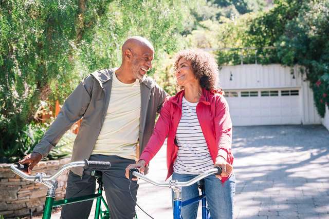 Older couple riding bikes